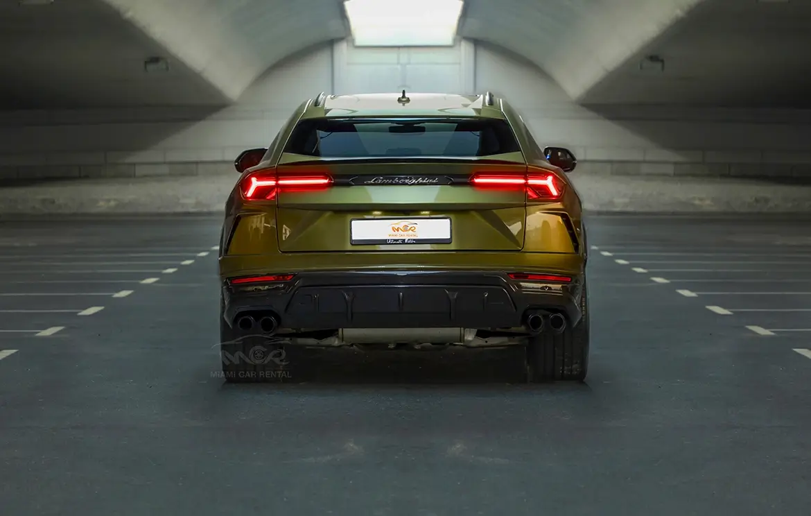 Hire the reliable Lamborghini Urus Dark Green SUV in Abu Dhabi