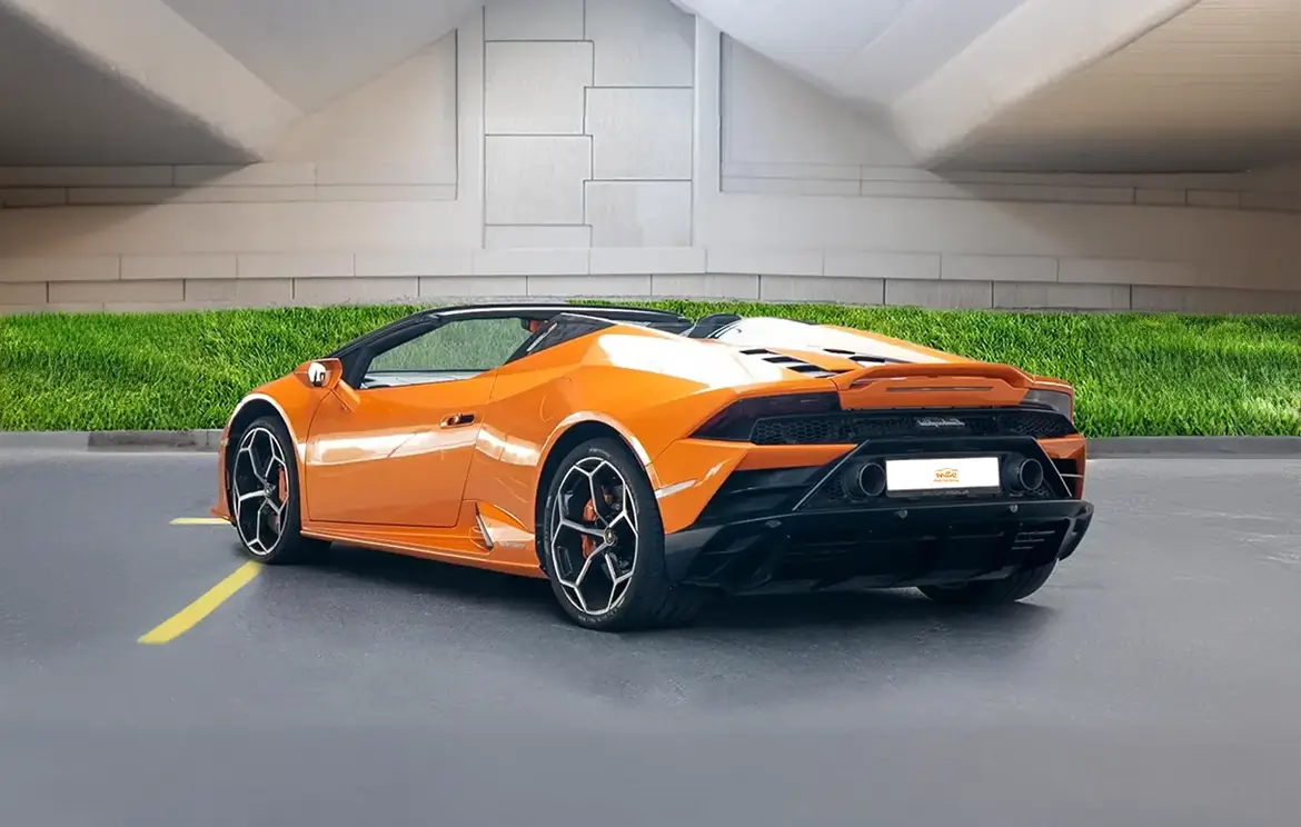 Rent the Lamborghini Huracan Evo Spyder Orange sports in Dubai